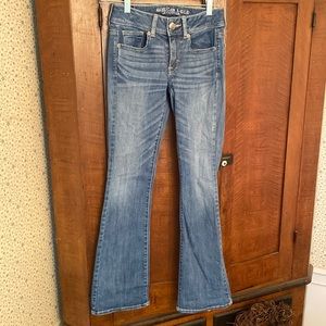 Medium wash denim kick boot jeans